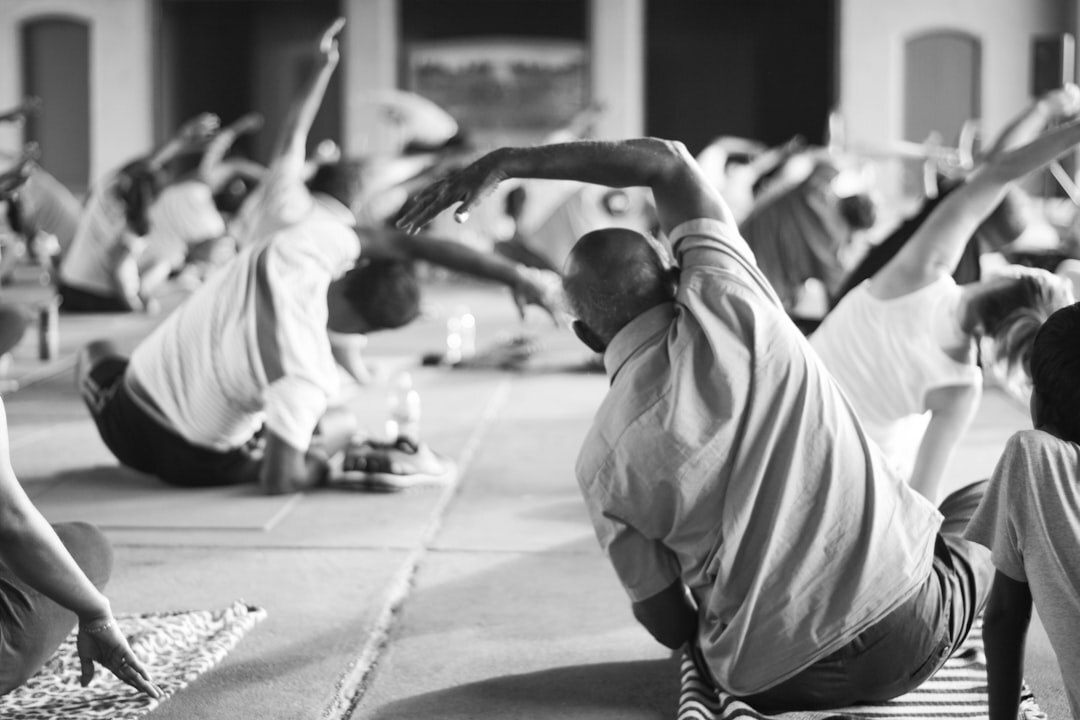 group of seniors doing yoga