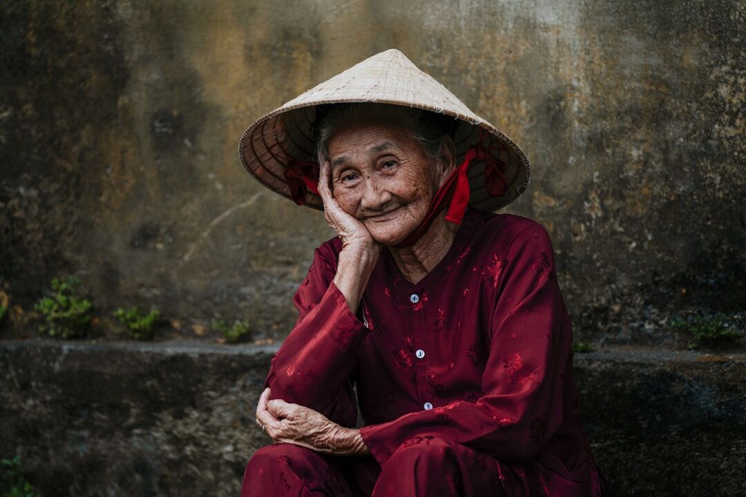 senior woman smiling outdoors