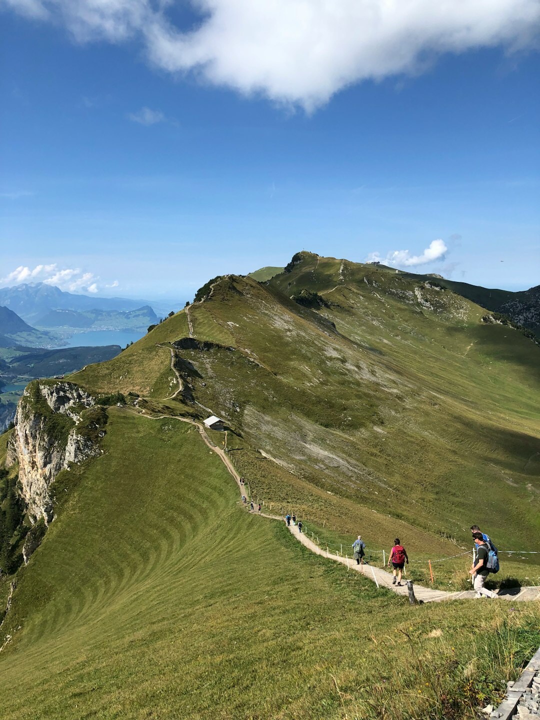 Group of seniors hiking together in the Swiss Alps